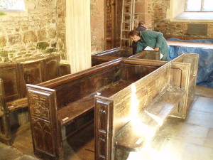 Surveying the rest of the church pews.