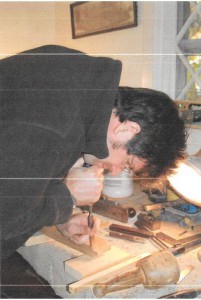 Using traditional hand tools.